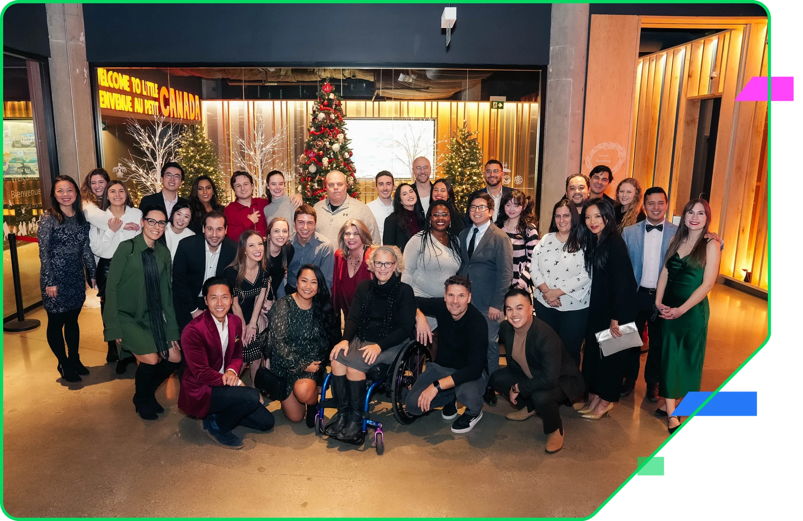 The whole team gathered for a group photograph at the company holiday party